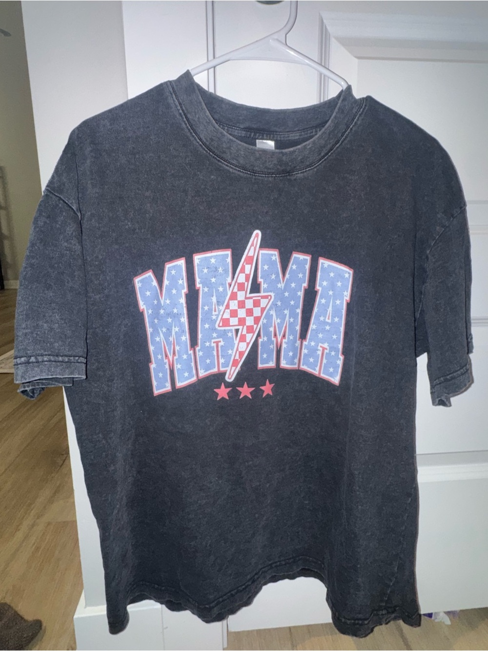 Women’s Black Graphic Tee with Star Bolt Design